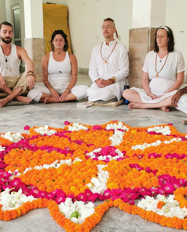 People meditating in yoga class