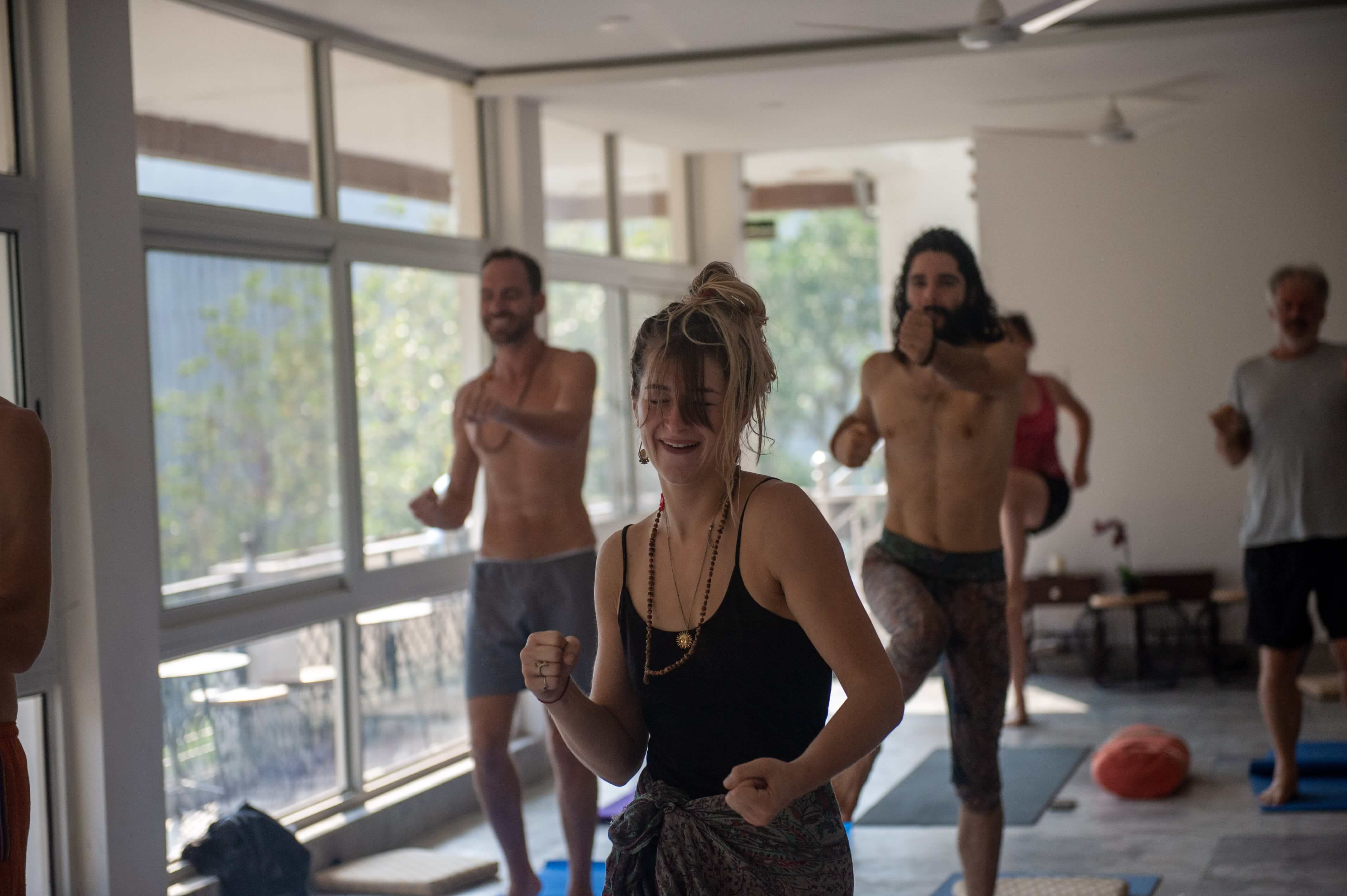 People dancing in yoga class