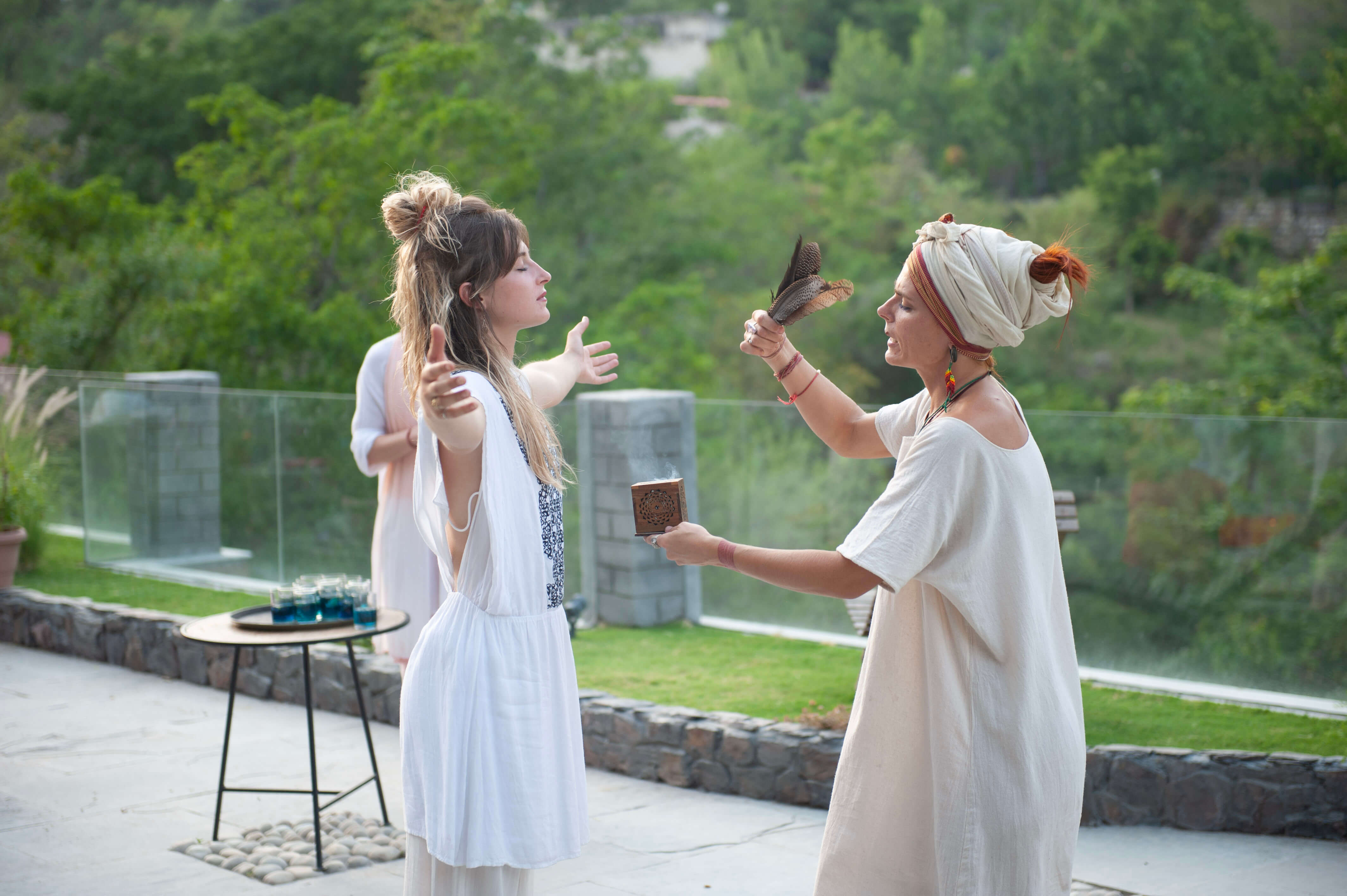 Two women during a shamanic breathwork ceremony