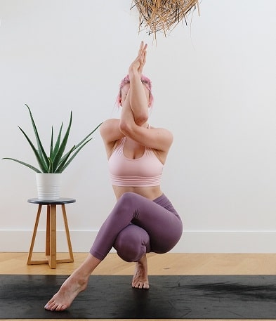 A woman practicing yoga